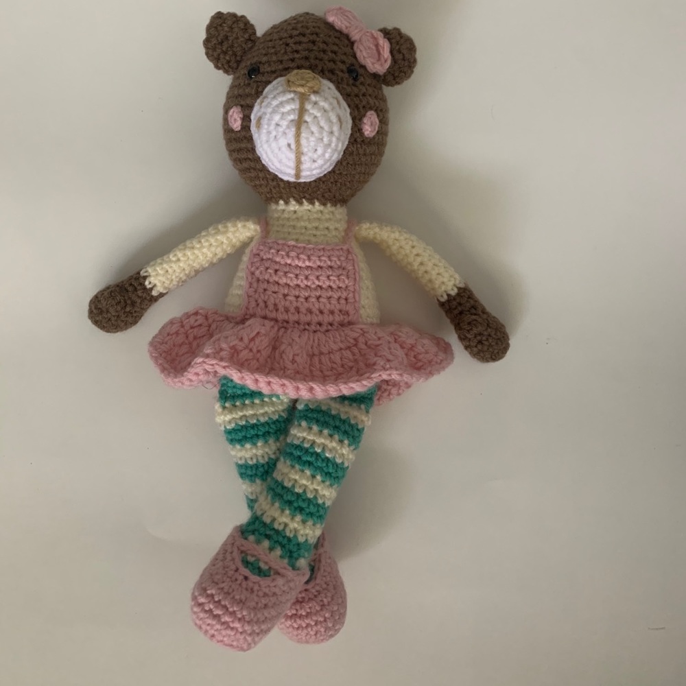 Amigurumi handmade baby toy.